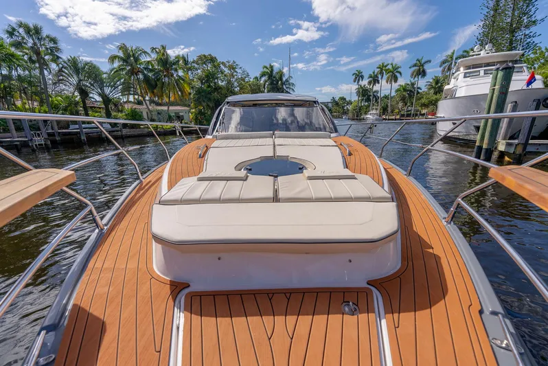 Music Yacht Photos Pics Luxurious 2024 Hanover 415 yacht with sleek deck design, docked in a scenic marina.