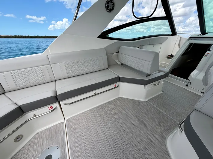  Yacht Photos Pics Interior of 2025 Sea Ray Sundancer 320 Outboard with gray upholstery.