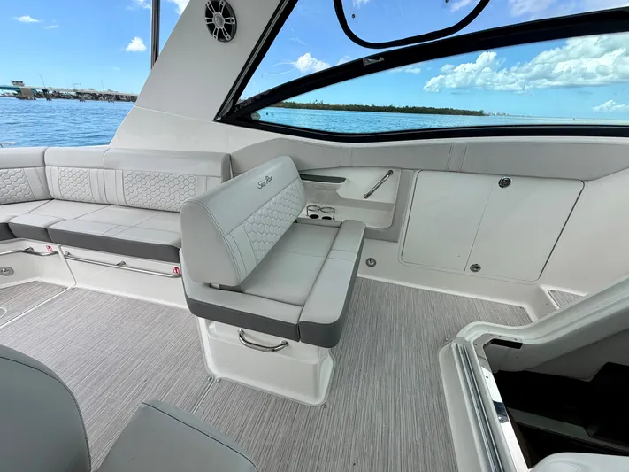  Yacht Photos Pics Interior of 2025 Sea Ray Sundancer 320 Outboard with gray upholstery.