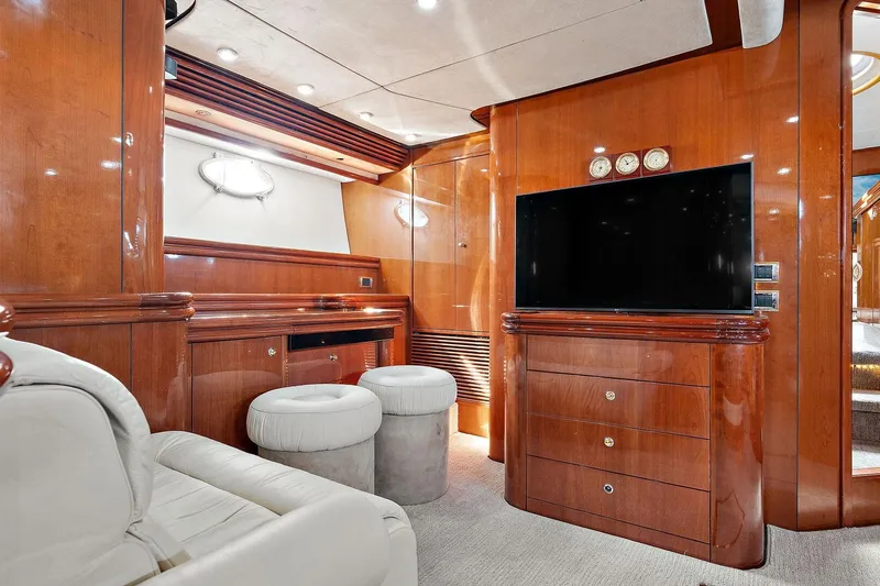 Blue Steel Yacht Photos Pics Luxurious interior of 1998 Sunseeker Predator 80 yacht with wood paneling and modern amenities.