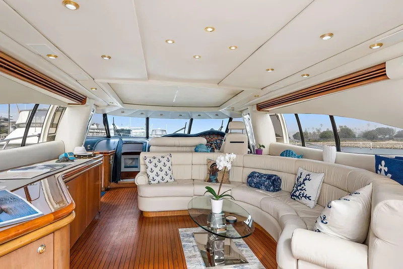 Blue Steel Yacht Photos Pics Luxurious interior of 1998 Sunseeker Predator 80 yacht with elegant seating and decor.