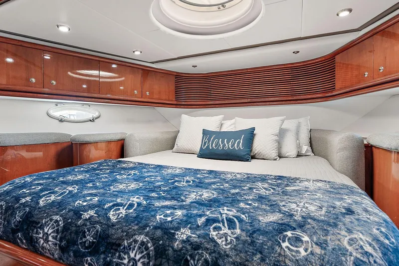 Blue Steel Yacht Photos Pics Luxurious cabin interior of 1998 Sunseeker Predator 80 yacht with plush bedding.