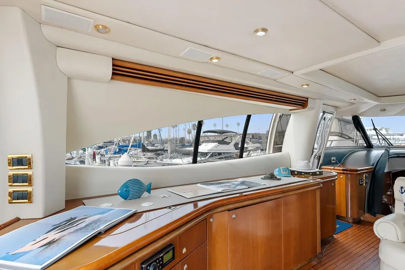 Blue Steel Yacht Photos Pics Luxurious interior of 1998 Sunseeker Predator 80 yacht with elegant wood finishes.