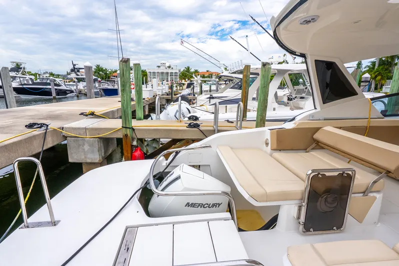 Ohana Yacht Photos Pics 2020 Aquila 32 boat docked at marina with Mercury engine.