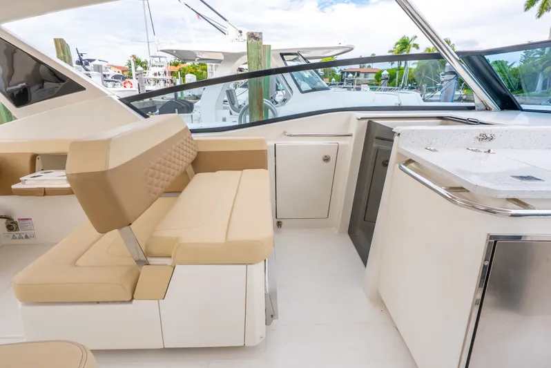 Ohana Yacht Photos Pics Interior of 2020 Aquila 32 yacht with beige seating and modern amenities.