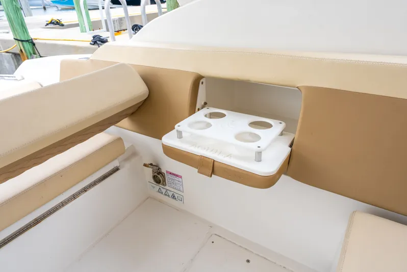 Ohana Yacht Photos Pics Interior of 2020 Aquila 32 boat featuring a built-in cup holder.