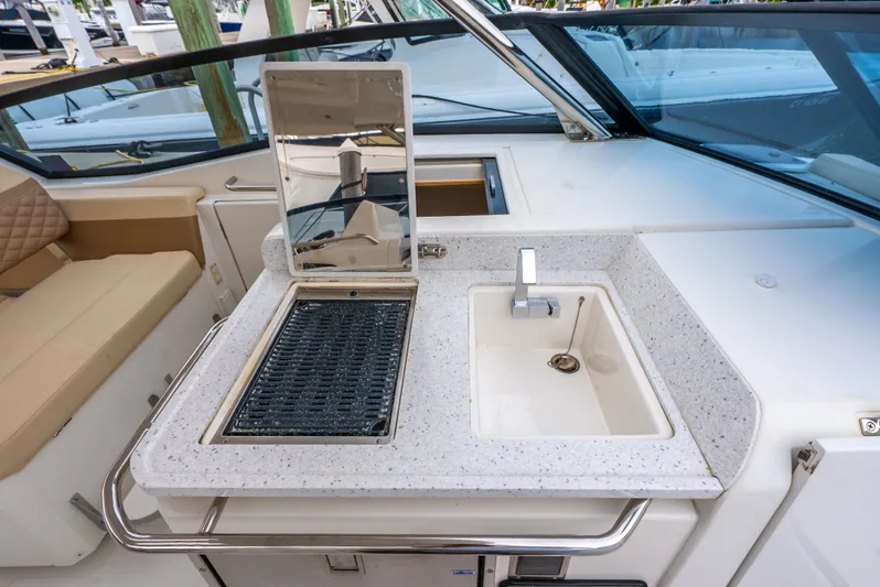 Ohana Yacht Photos Pics Aquila 32 yacht kitchen area with sink and grill, 2020 model.
