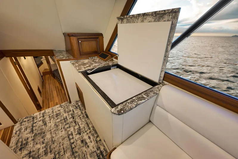 Grand Slam Yacht Photos Pics Interior of 2004 Guthrie 60 Custom Carolina yacht with ocean view and elegant wood finish.