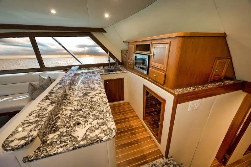 Grand Slam Yacht Photos Pics Luxurious 2004 Guthrie 60 Custom Carolina yacht interior with elegant kitchen and ocean view.