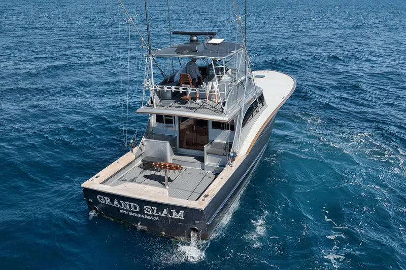 Grand Slam Yacht Photos Pics 2004 Guthrie 60 Custom Carolina yacht cruising on open ocean waters.