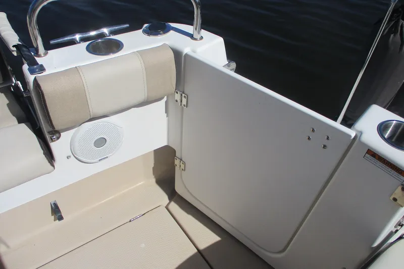 I'm Busy Yacht Photos Pics 2015 Cutwater 30 Command Bridge LE boat interior with seating and speaker.