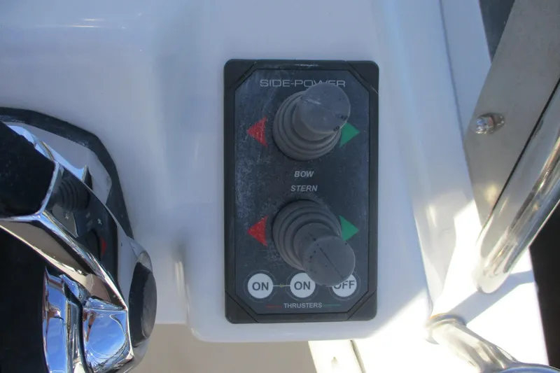 I'm Busy Yacht Photos Pics Control panel of 2015 Cutwater 30 Command Bridge LE with bow and stern thrusters.