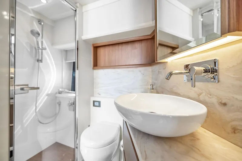 Sipsip Yacht Photos Pics Luxurious bathroom in 2018 Absolute 52 FLY yacht with modern fixtures and elegant design.