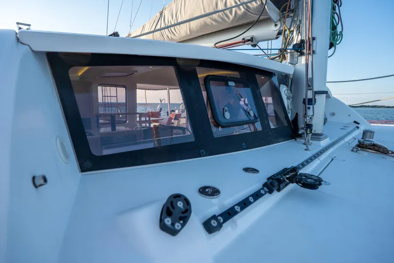 Rima Yacht Photos Pics 2018 Outremer 51 yacht deck with cabin windows and sailing equipment.