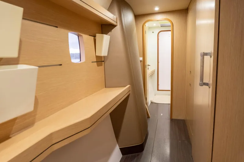 Rima Yacht Photos Pics Interior of 2018 Outremer 51 yacht, featuring sleek wooden design and modern fixtures.