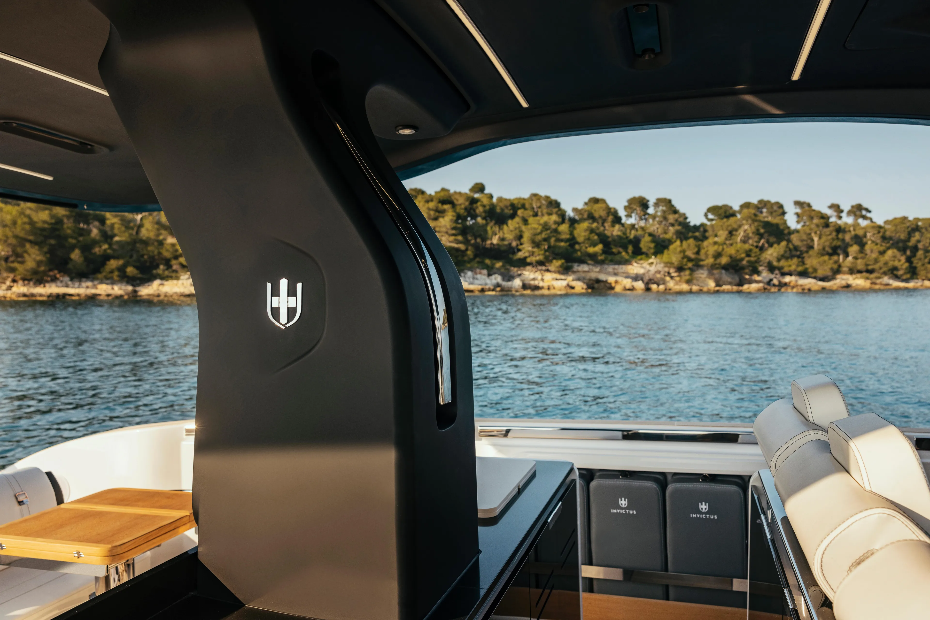  Yacht Photos Pics Invictus TT420 yacht interior with scenic water and forest view, 2025 model.