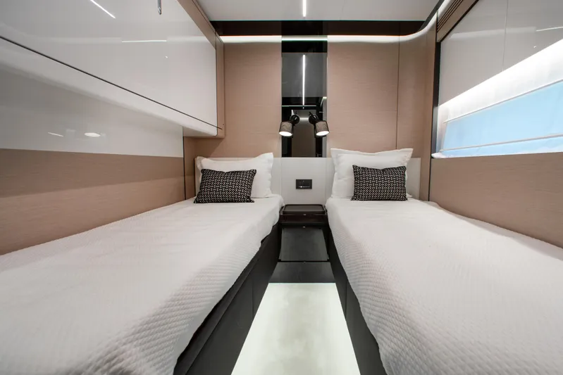  Yacht Photos Pics Luxurious twin cabin interior of 2022 Azimut S8 yacht with modern design and elegant bedding.