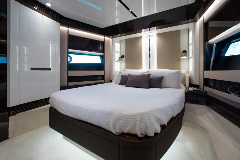  Yacht Photos Pics Luxurious bedroom interior of 2022 Azimut S8 yacht with modern design and elegant furnishings.