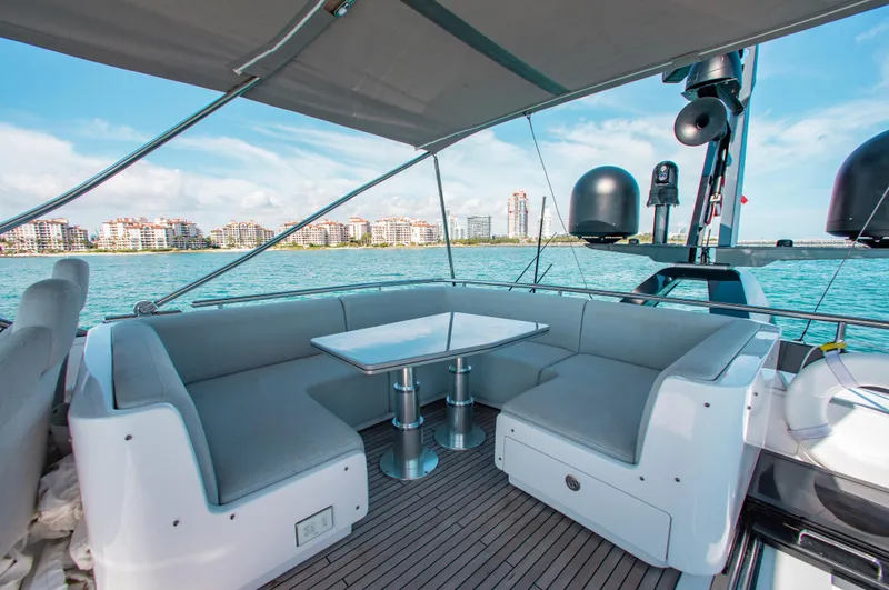  Yacht Photos Pics Luxurious 2022 Azimut S8 yacht deck with elegant seating and ocean view.