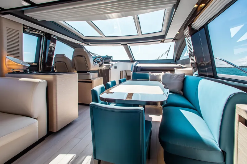  Yacht Photos Pics Luxurious interior of 2022 Azimut S8 yacht with modern seating and panoramic windows.