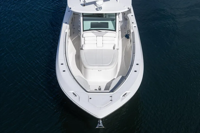 Vaquero Chingon Yacht Photos Pics 2016 Boston Whaler 370 Outrage boat on calm water, aerial view.
