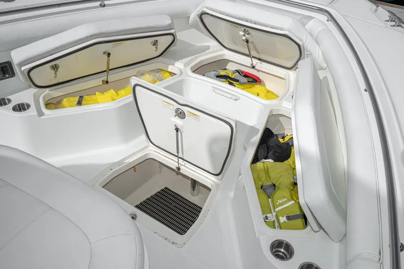 Vaquero Chingon Yacht Photos Pics 2016 Boston Whaler 370 Outrage boat storage compartments with life jackets and gear.