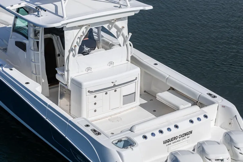 Vaquero Chingon Yacht Photos Pics 2016 Boston Whaler 370 Outrage boat on water, featuring spacious deck and seating.