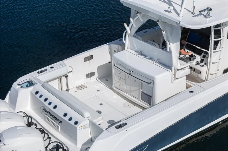 Vaquero Chingon Yacht Photos Pics 2016 Boston Whaler 370 Outrage boat with spacious deck and modern controls.