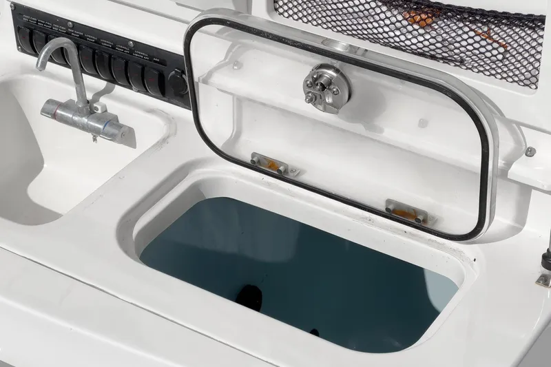 Vaquero Chingon Yacht Photos Pics 2016 Boston Whaler 370 Outrage boat sink and storage compartment detail.