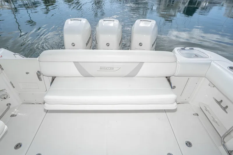 Vaquero Chingon Yacht Photos Pics 2016 Boston Whaler 370 Outrage boat with triple Mercury engines and white seating.