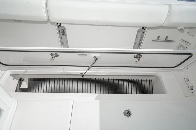 Vaquero Chingon Yacht Photos Pics Open storage compartment on a 2016 Boston Whaler 370 Outrage boat.