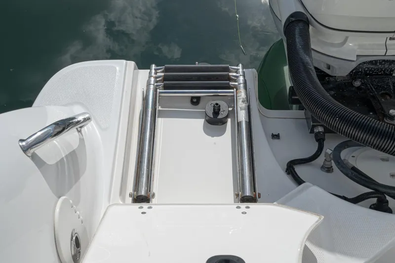 Vaquero Chingon Yacht Photos Pics 2016 Boston Whaler 370 Outrage swim platform with stainless steel ladder and railing.