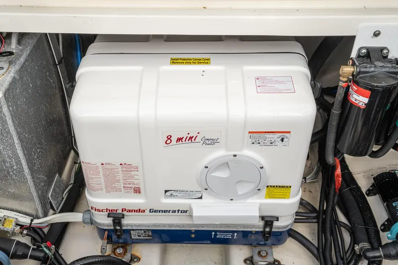 Vaquero Chingon Yacht Photos Pics Fischer Panda generator in 2016 Boston Whaler 370 Outrage boat engine compartment.