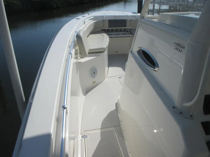  Yacht Photos Pics 2018 Cobia 301 Center Console boat interior with seating and console view.
