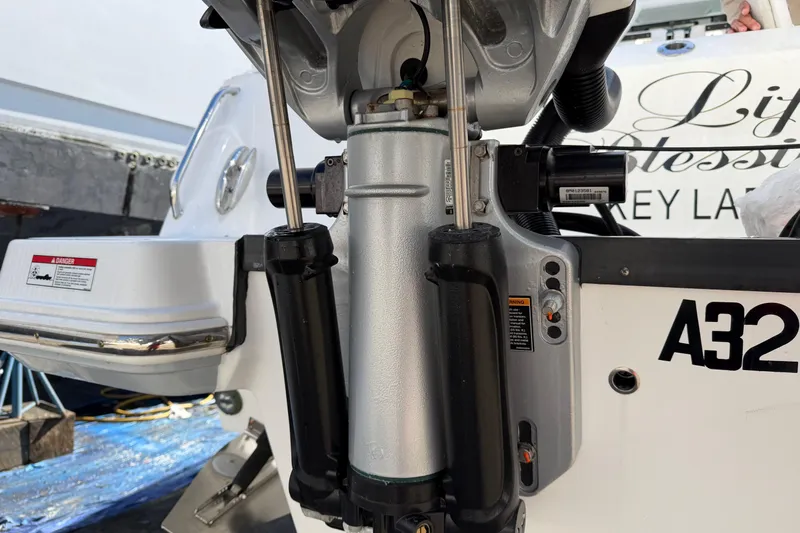  Yacht Photos Pics Close-up of 2023 Blackfin 302 CC boat engine components and hydraulic system.