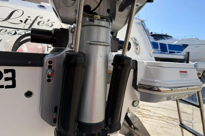  Yacht Photos Pics Close-up of 2023 Blackfin 302 CC boat engine components and hydraulic system.