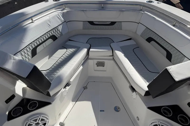  Yacht Photos Pics 2023 Blackfin 302 CC boat interior with luxurious seating and modern design.