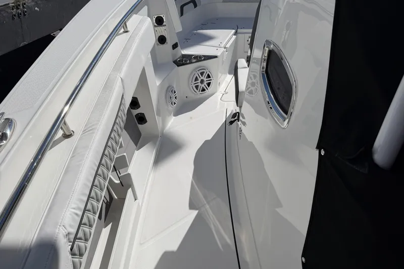  Yacht Photos Pics 2023 Blackfin 302 CC boat interior with sleek seating and modern design.
