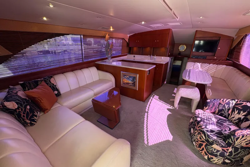 Fender Bender Yacht Photos Pics Luxurious interior of 1996 Ocean Yachts 48 Super Sport with elegant seating and modern amenities.