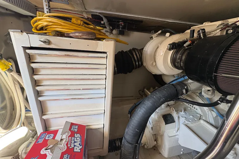 Fender Bender Yacht Photos Pics Engine room of a 1996 Ocean Yachts 48 Super Sport with tools and equipment.