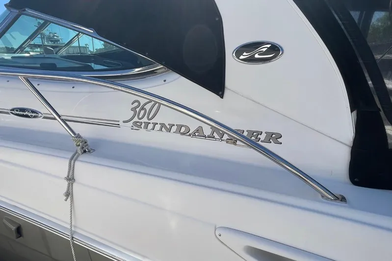 Irish Rover Yacht Photos Pics 2006 Sea Ray 360 Sundancer boat with sleek design and chrome accents.