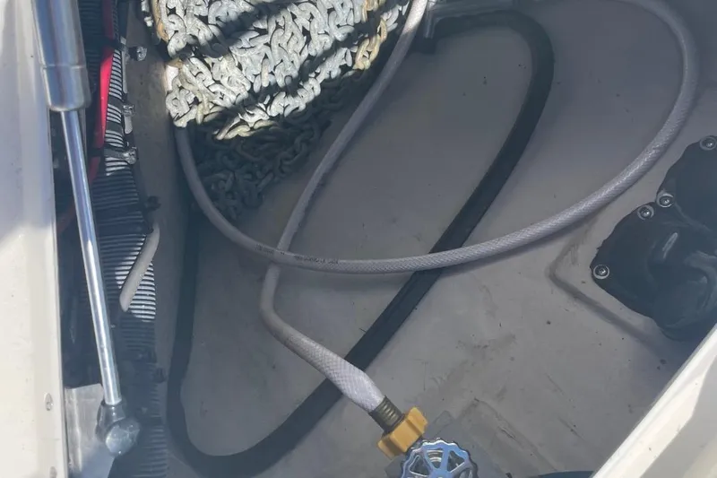 Irish Rover Yacht Photos Pics Anchor chain and hose in 2006 Sea Ray 360 Sundancer boat compartment.