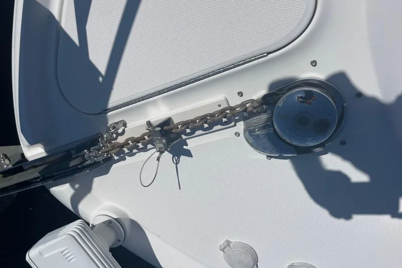 Irish Rover Yacht Photos Pics Anchor chain mechanism on a 2006 Sea Ray 360 Sundancer boat deck.