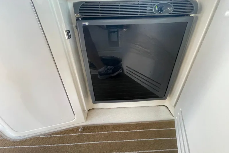 Irish Rover Yacht Photos Pics Compact refrigerator on 2006 Sea Ray 360 Sundancer yacht interior.