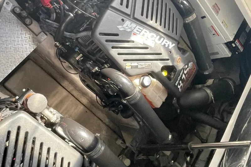 Irish Rover Yacht Photos Pics Engine compartment of a 2006 Sea Ray 360 Sundancer with Mercury components.