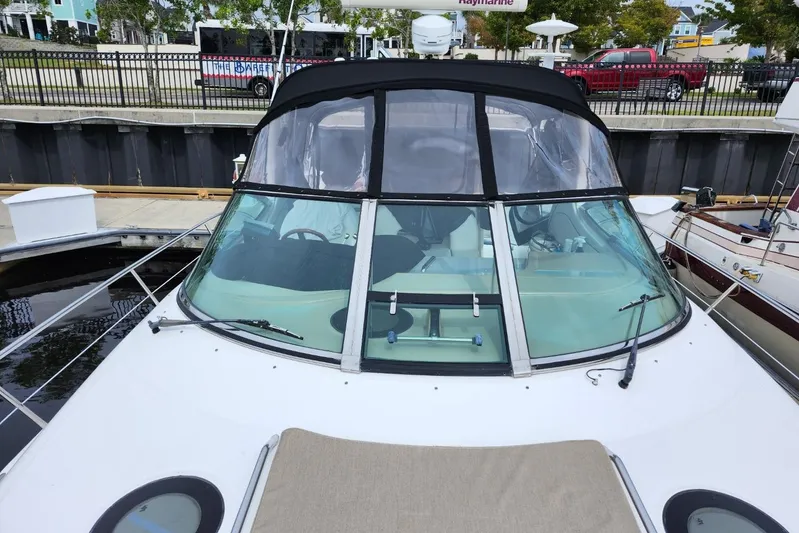 Irish Rover Yacht Photos Pics 2006 Sea Ray 360 Sundancer yacht docked at marina, front view.