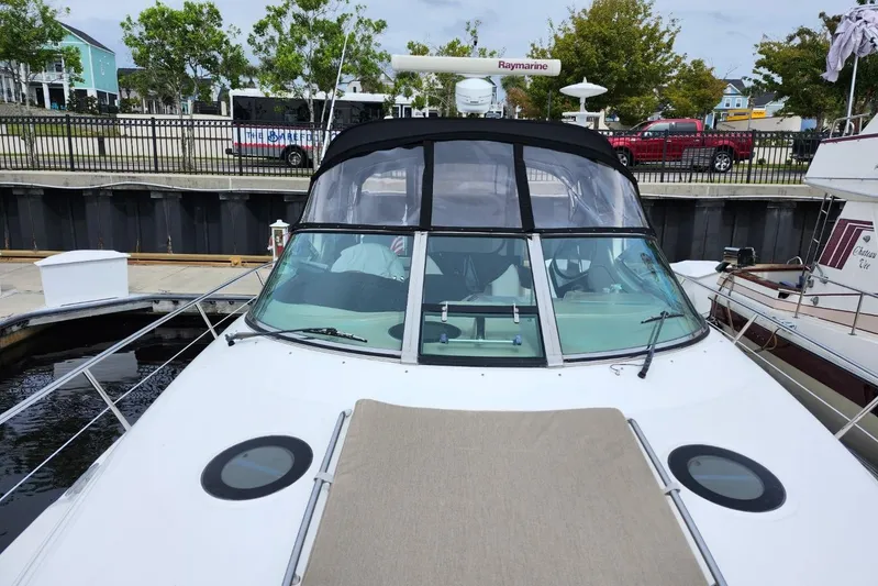 Irish Rover Yacht Photos Pics 2006 Sea Ray 360 Sundancer docked, featuring sleek design and spacious deck area.