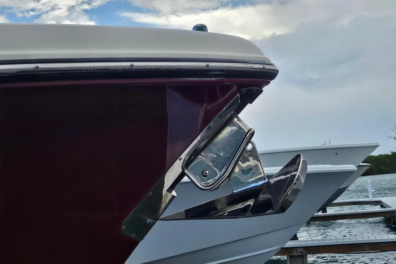  Yacht Photos Pics 2012 Pursuit C 310 Center Console boat at dock, featuring sleek design and chrome details.