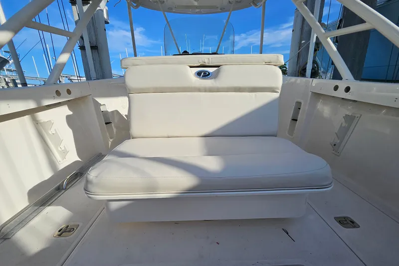  Yacht Photos Pics 2012 Pursuit C 310 Center Console boat interior with cushioned seating.