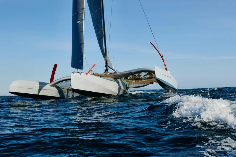  Yacht Photos Pics Westerly GF 42 Custom 2012 trimaran sailing on open sea with blue sky.